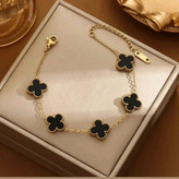 دستبند ونکلیف زنانه ی استیل به رنگ های طلایی و نقره ای با سنگ سفید و مشکی