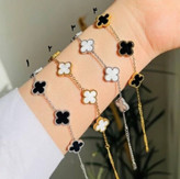 دستبند ونکلیف زنانه ی استیل به رنگ های طلایی و نقره ای با سنگ سفید و مشکی