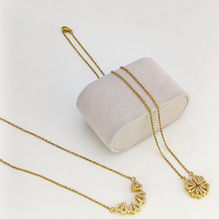 «گردنبند استیل طرح چهار قلب دو حالته ی نگیندار زنانه در رنگهای طلایی و نقرهای»